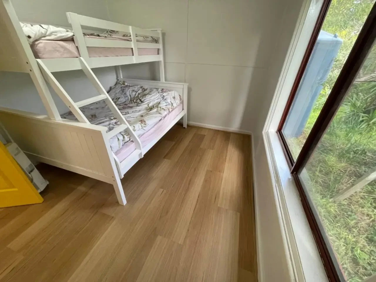 Cosy Tin Shack second bedroom with bunk beds