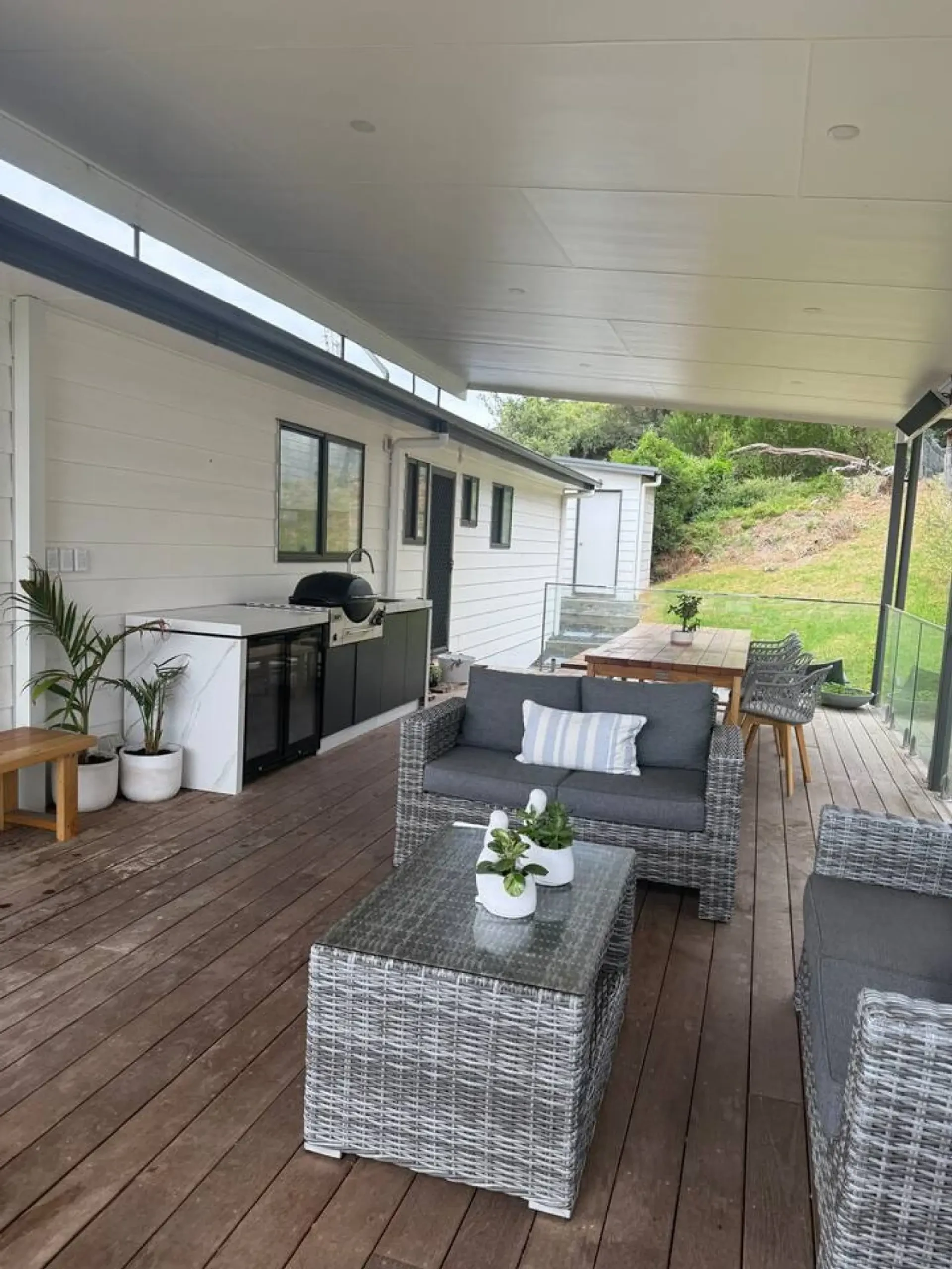 Lancaster Lodge covered outdoor kitchen and lounge deck