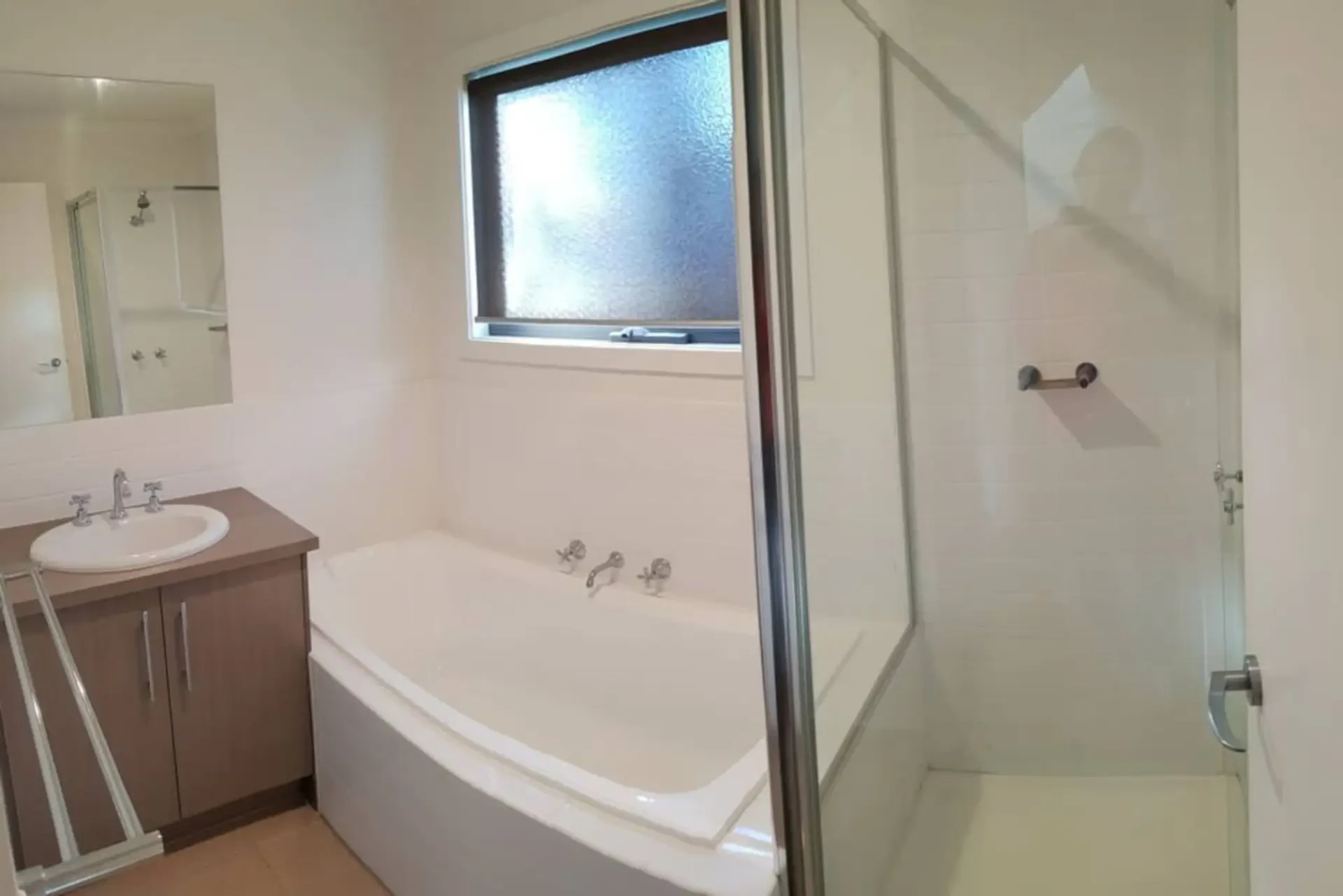 Venus Haven main bathroom with bath and shower