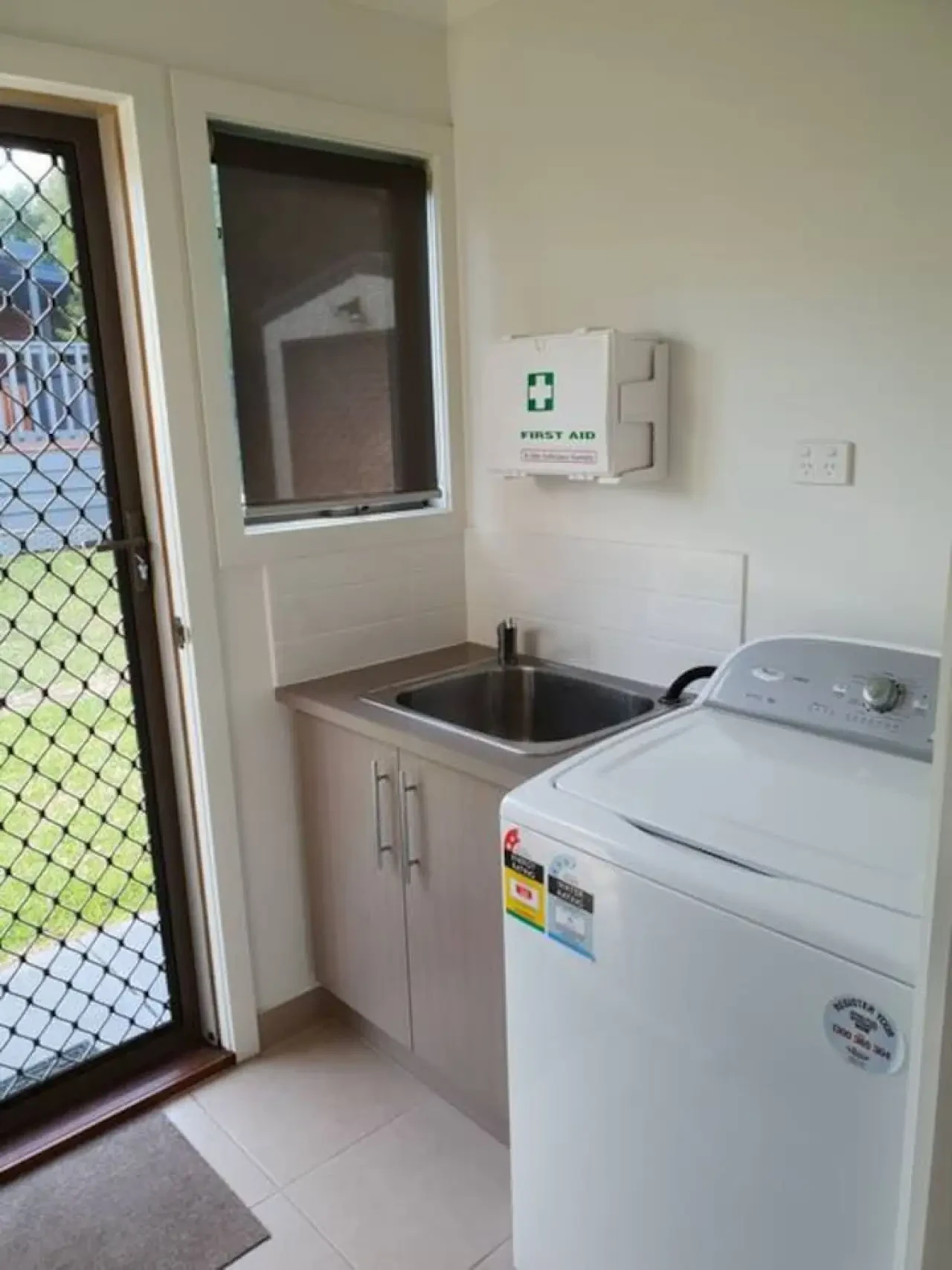 Venus Haven laundry with washing machine