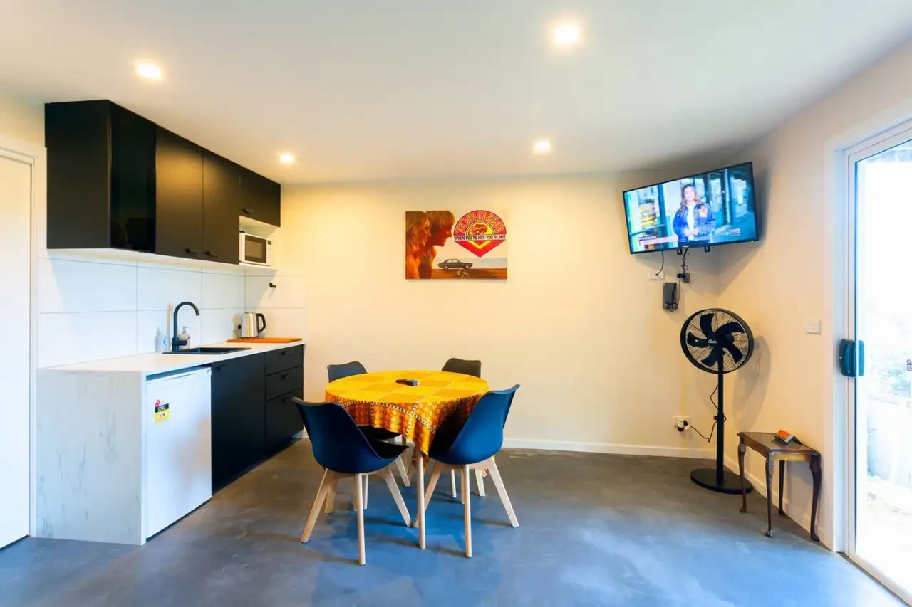 Retro Dunes kitchen dining area with blue chairs